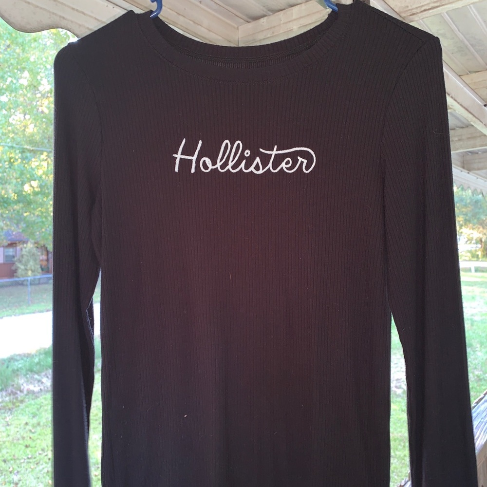 black fitted long sleeve top